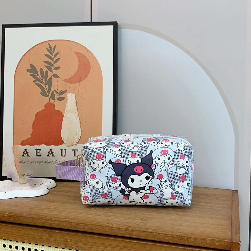 Cosmetic bag with cartoon design on a wooden surface with a framed picture in the background