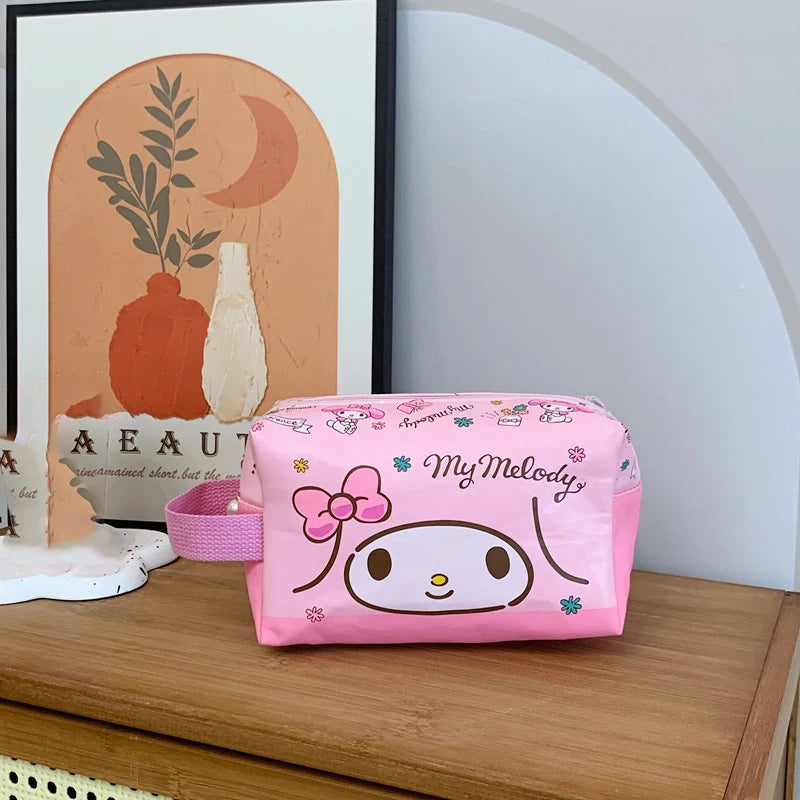 Pink pouch with cartoon character on a wooden surface
