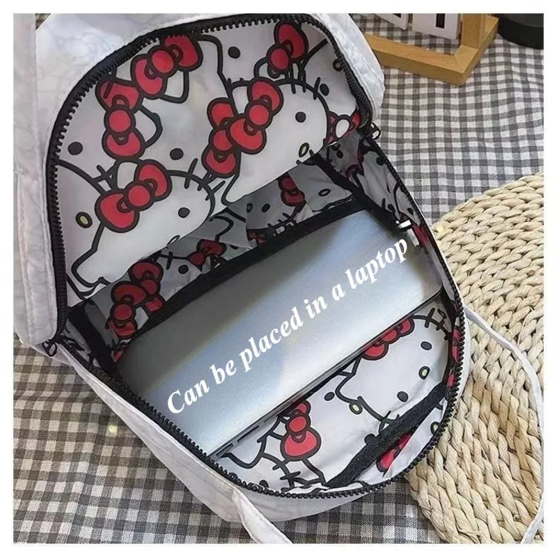 Backpack with Hello Kitty design on a checkered surface