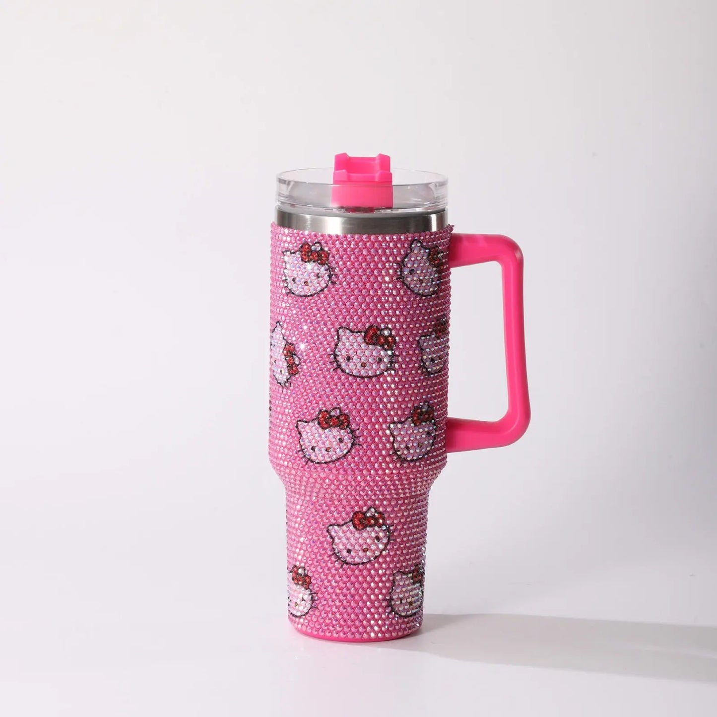 Pink tumbler with Hello Kitty design on a white background