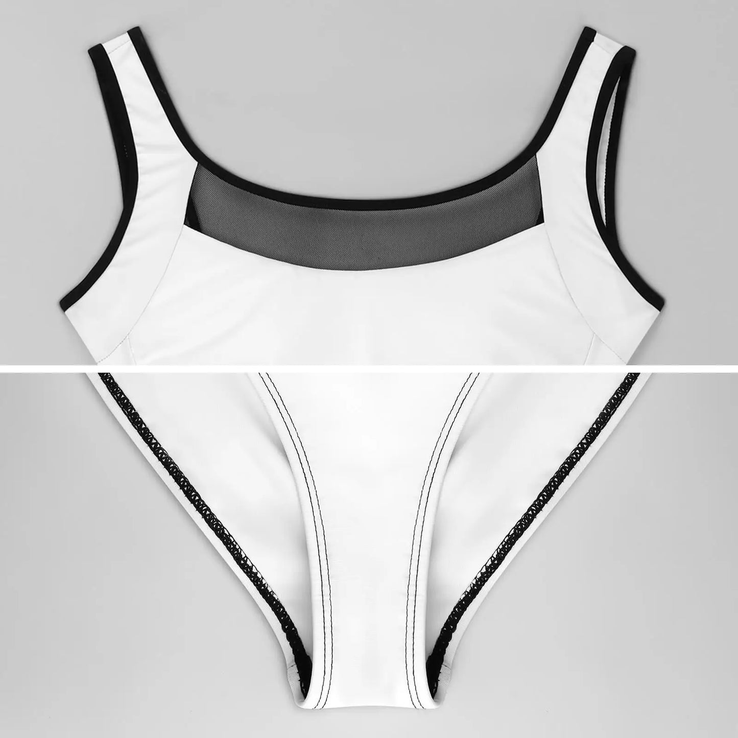 White swimsuit with black trim on a gray background