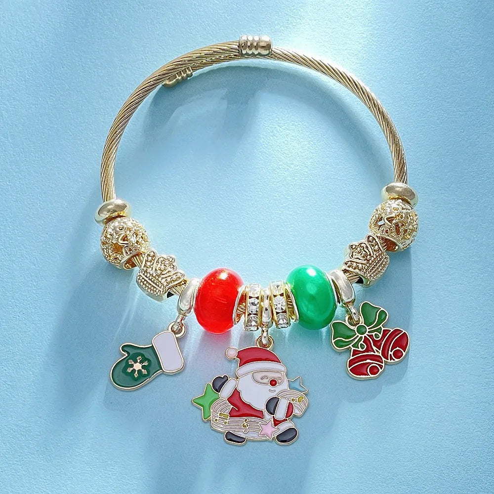 Bracelet with Christmas-themed charms on a light blue background