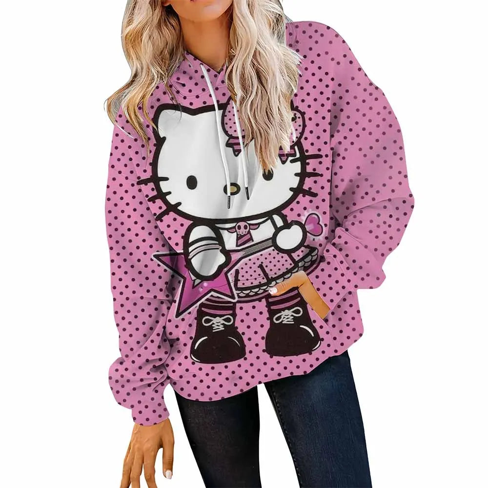 Pink polka dot hoodie with Hello Kitty design on a white background