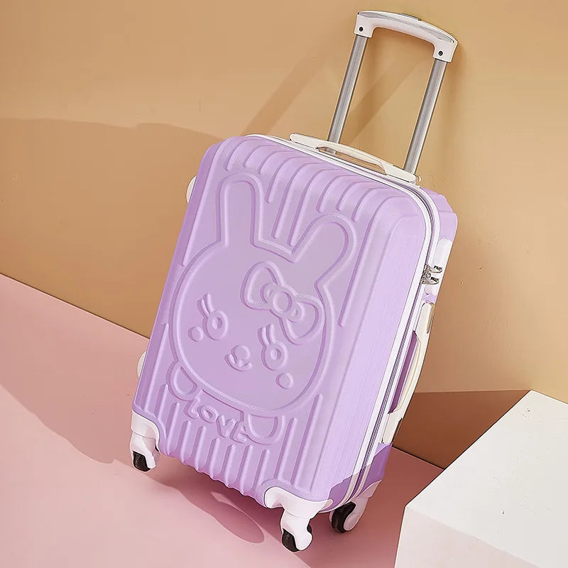 Purple suitcase with a cartoon character design on a pink and beige background