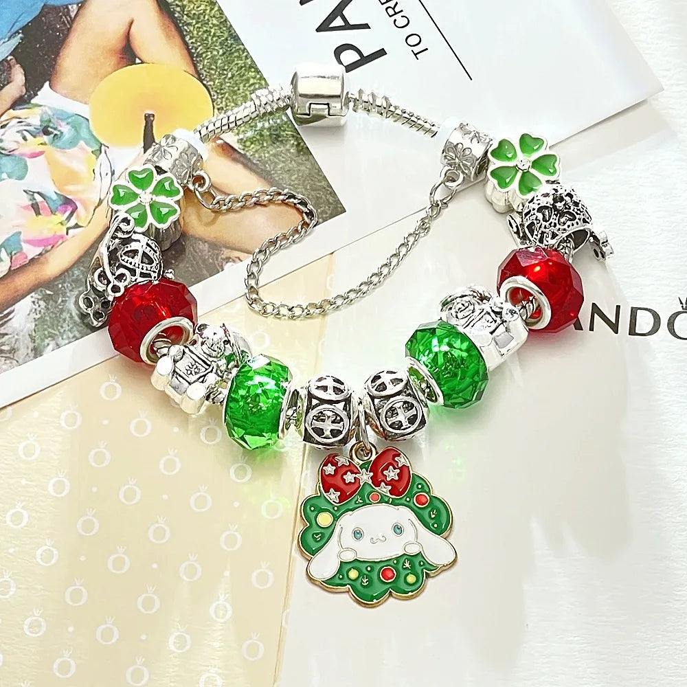 Bracelet with various charms including a ghost pendant on a magazine background