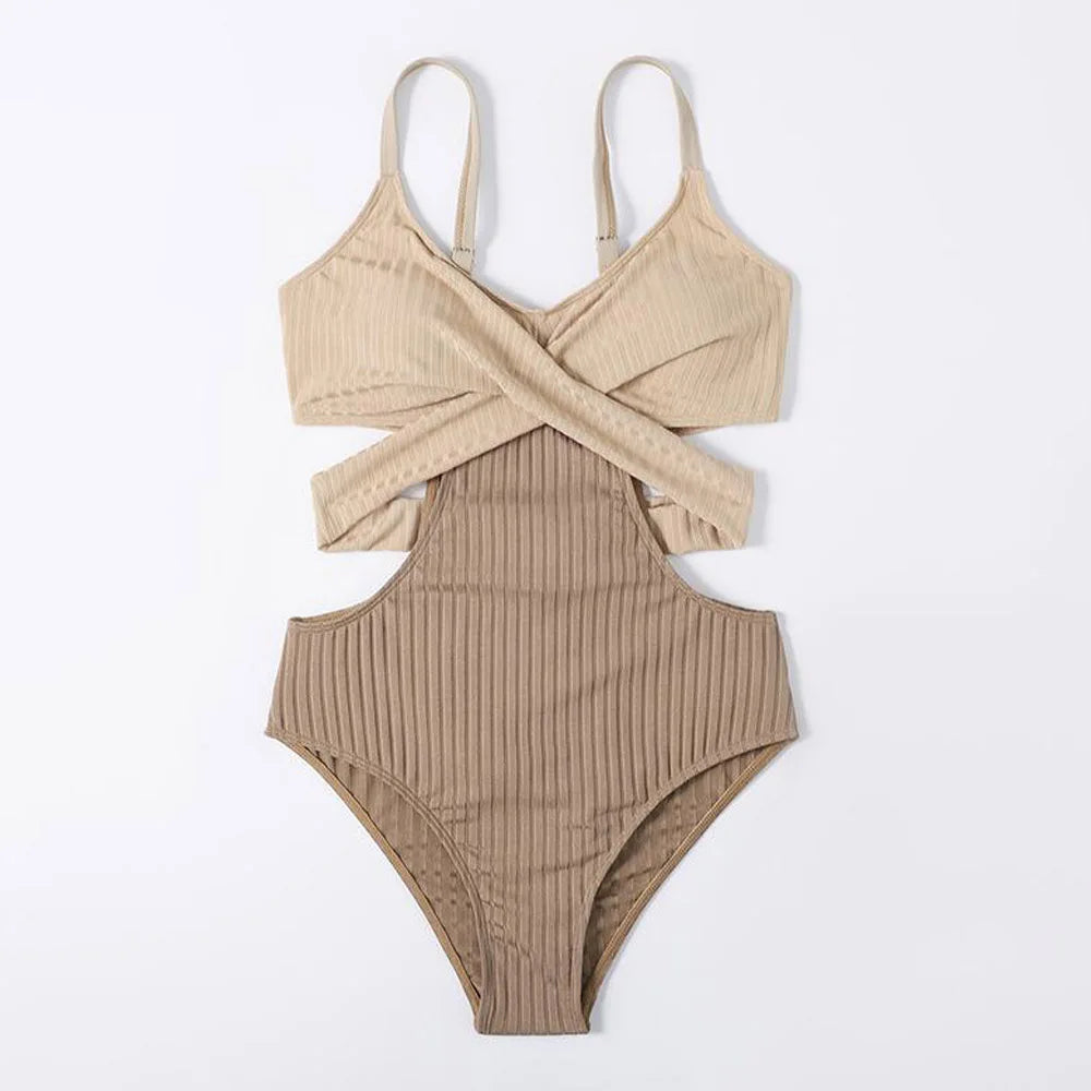 Beige ribbed swimsuit with criss-crossed top on a white background