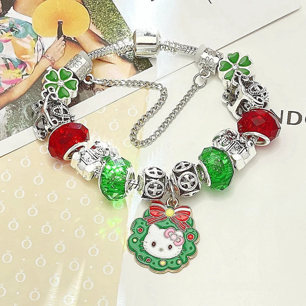 Bracelet with colorful charms including a Hello Kitty design on a magazine background
