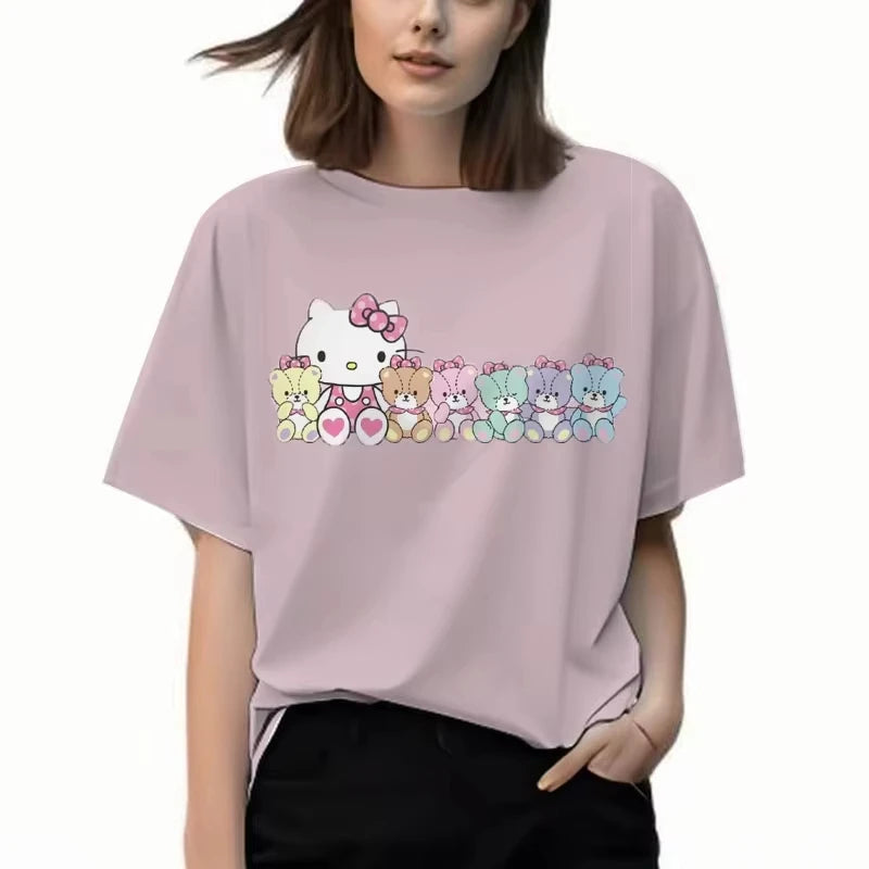 Person wearing a light pink t-shirt with a cartoon character design on a white background