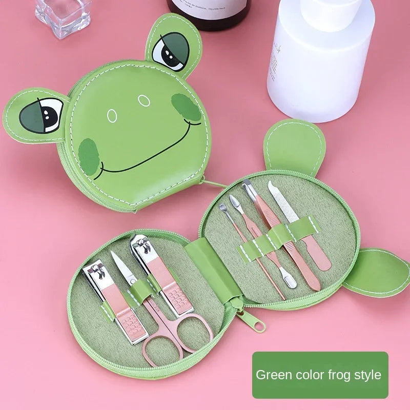 Green frog-shaped nail care set on a pink background