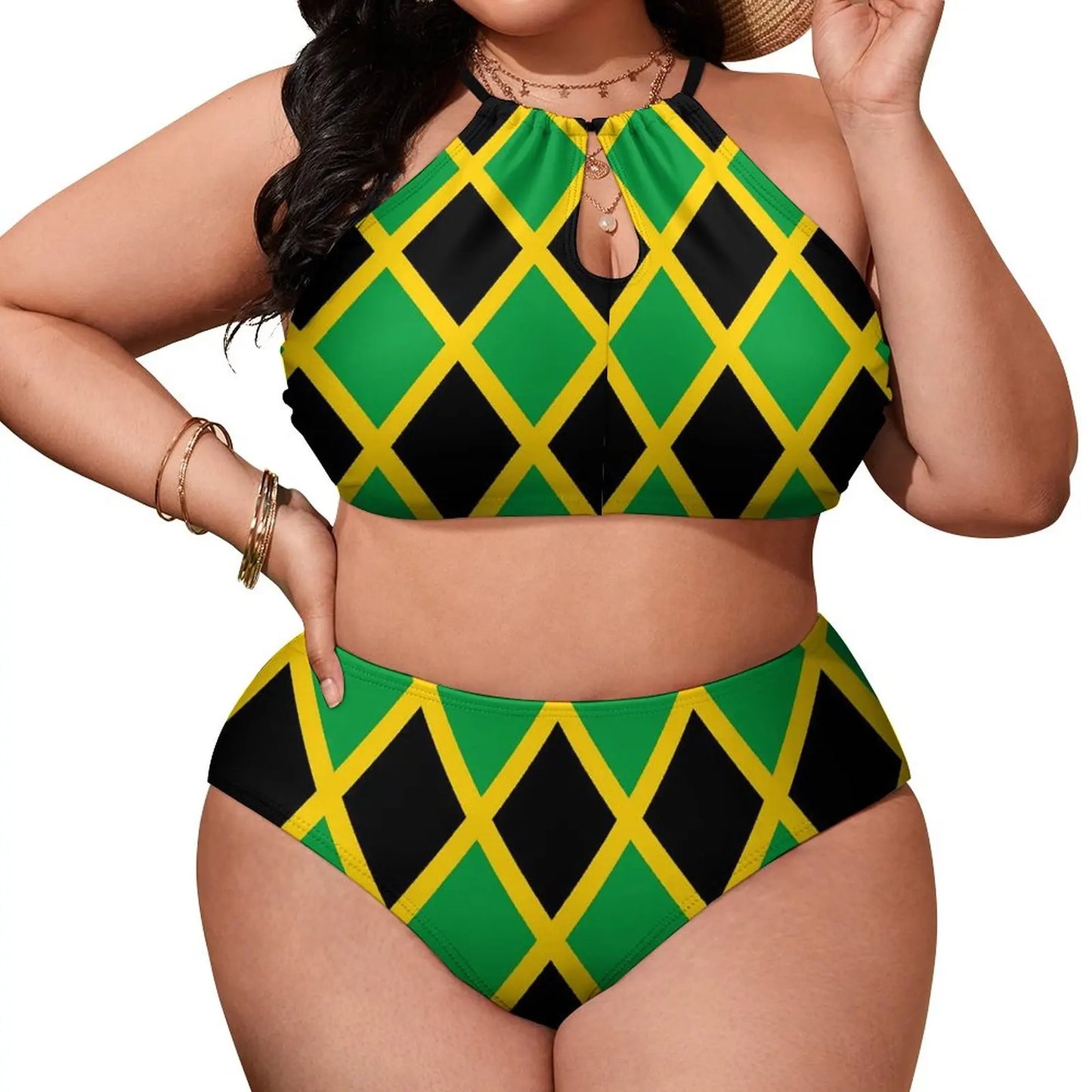 Woman wearing a green, black, and yellow patterned two-piece swimsuit on a white background