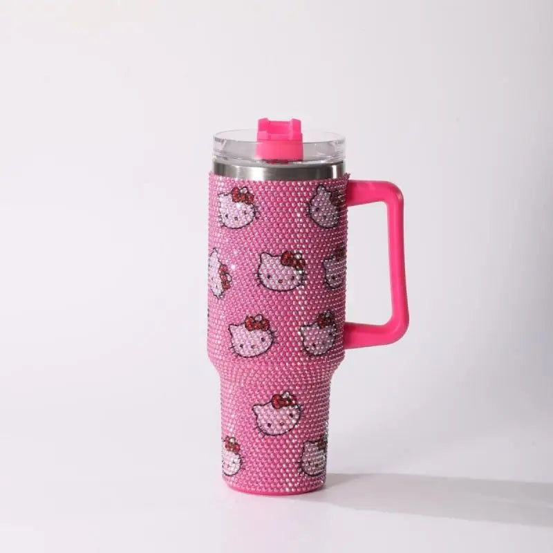 Pink tumbler with Hello Kitty design on a white background