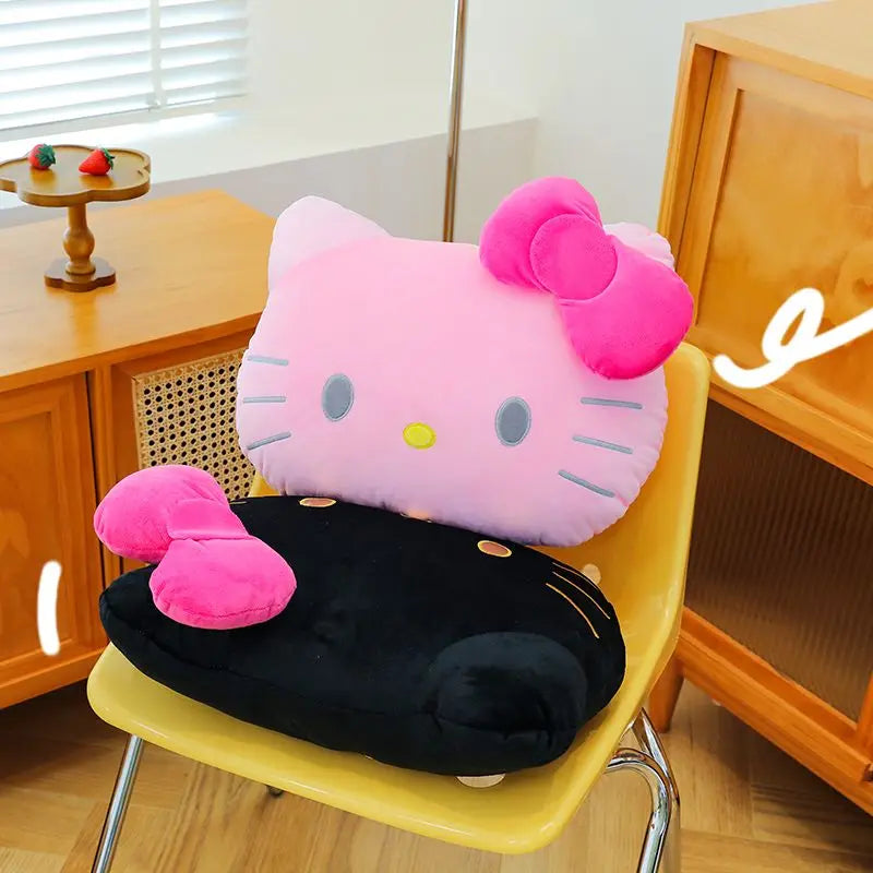 Plush Hello Kitty pillow cushion on a chair in a room.
