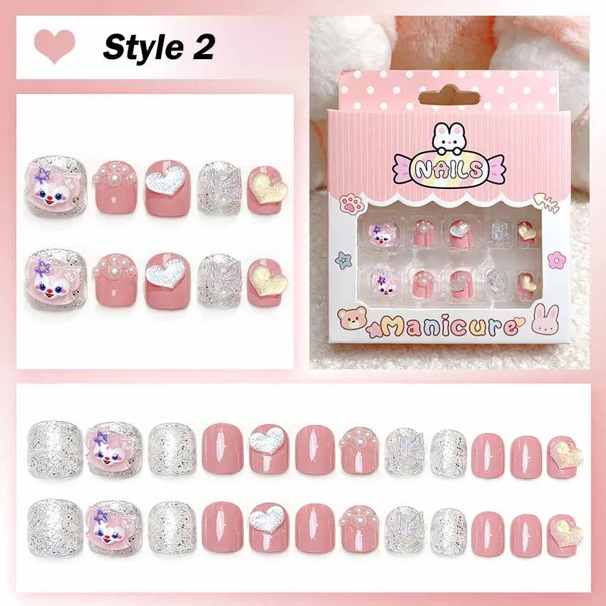 Set of pink and silver nail art designs with packaging labeled 'Manicure' on a pink background.