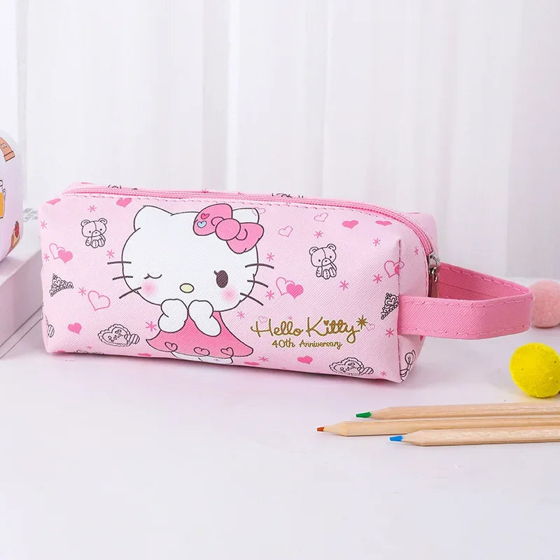 Pink pencil case with Hello Kitty design on a white background