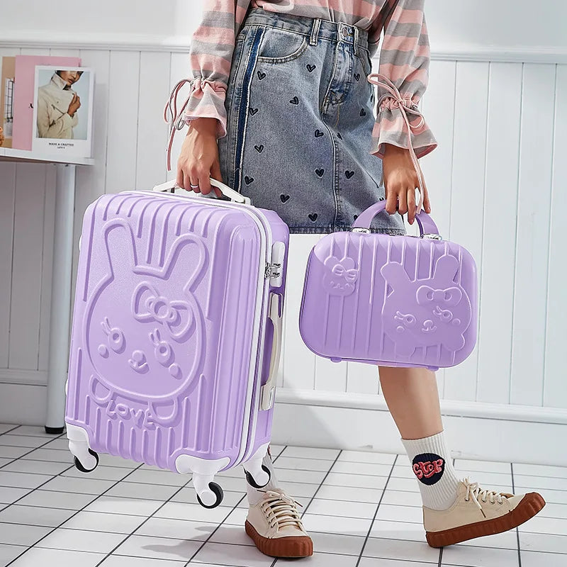 Person holding a purple suitcase and matching pouch with a cartoon design, standing in a room.