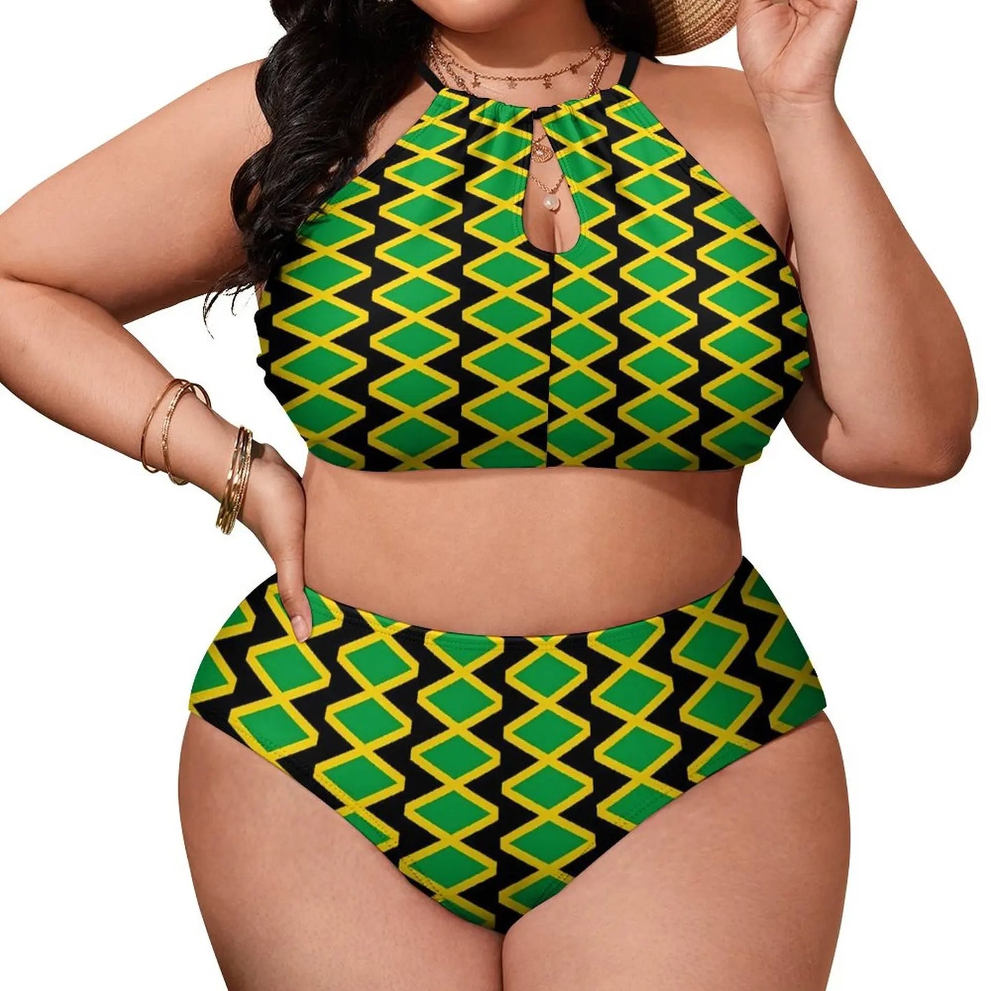 Woman wearing a green and black patterned two-piece swimsuit on a white background