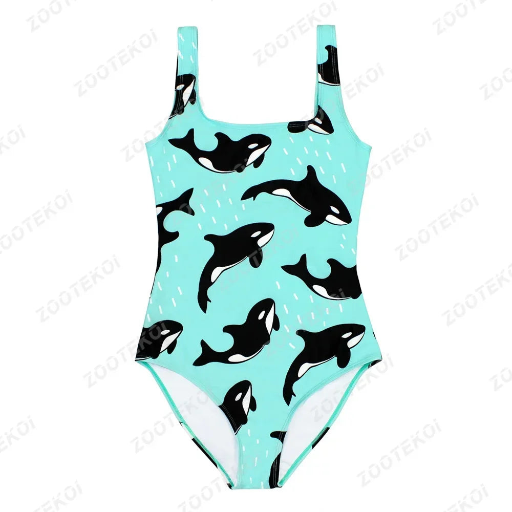 One-piece swimsuit with orca whale pattern on a light blue background