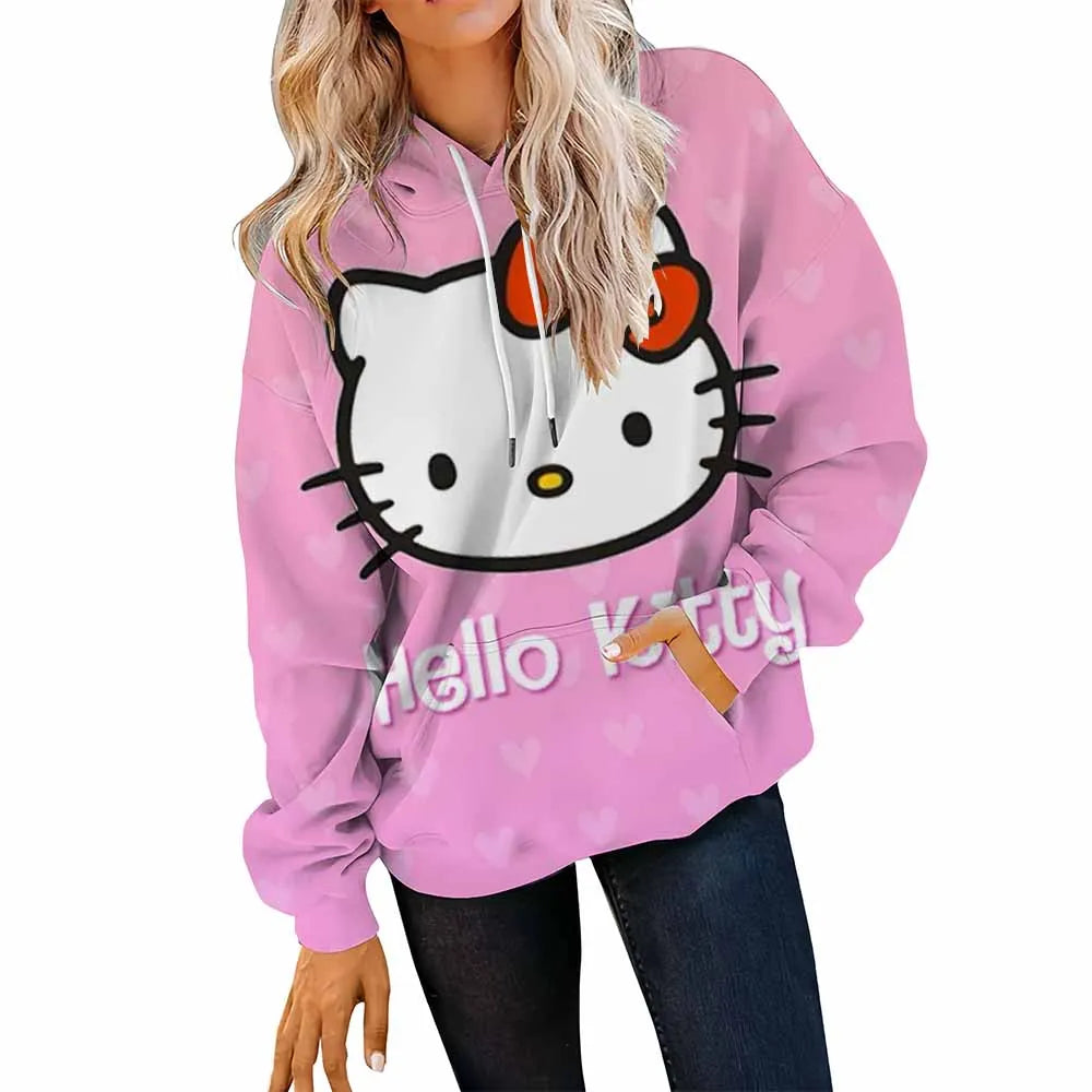 Pink 'Hello Kitty' hoodie worn by a person on a white background