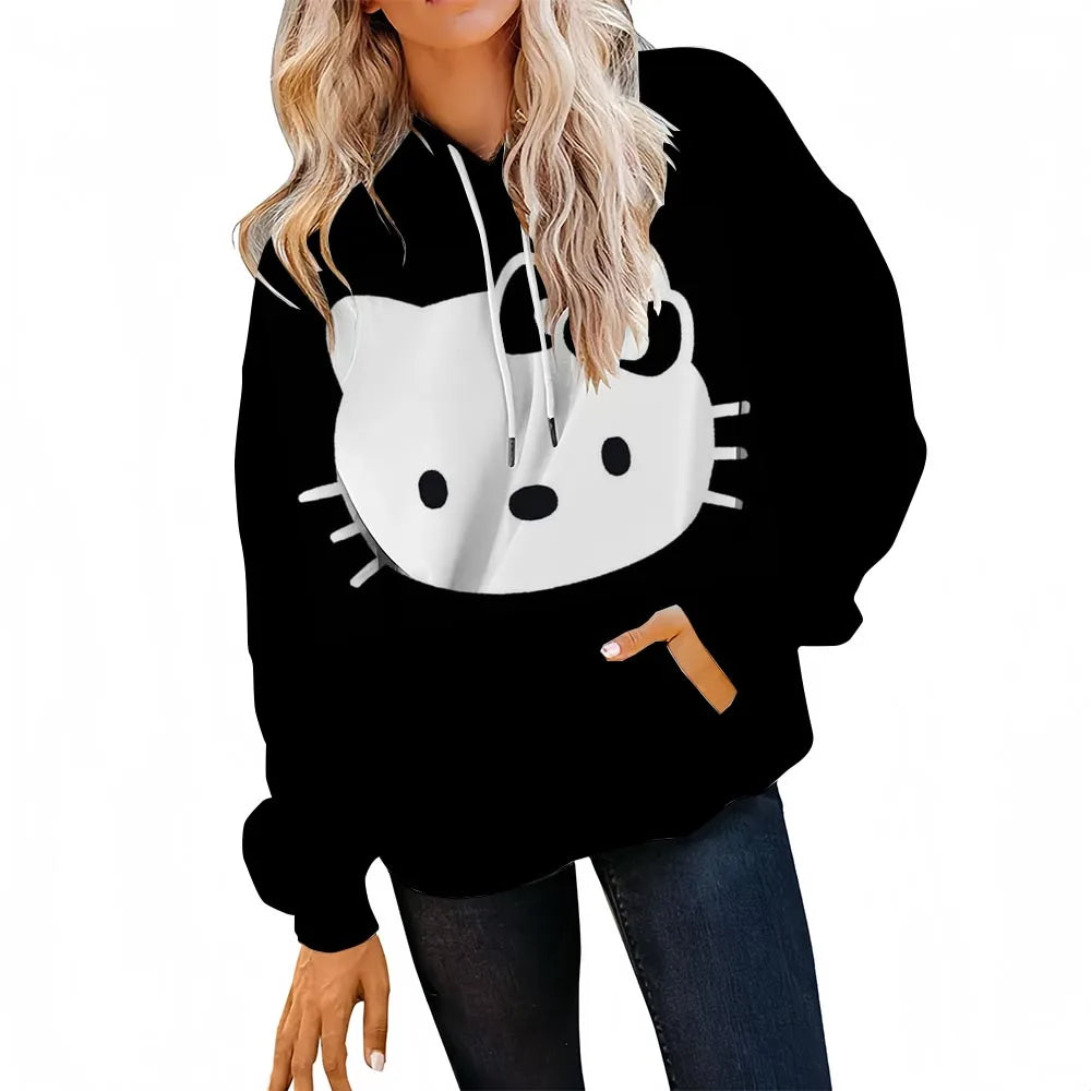 Black hoodie with a white cat face design worn by a person on a white background