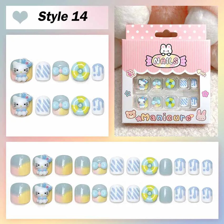 Set of cartoon-themed nail designs with packaging on a light pink background