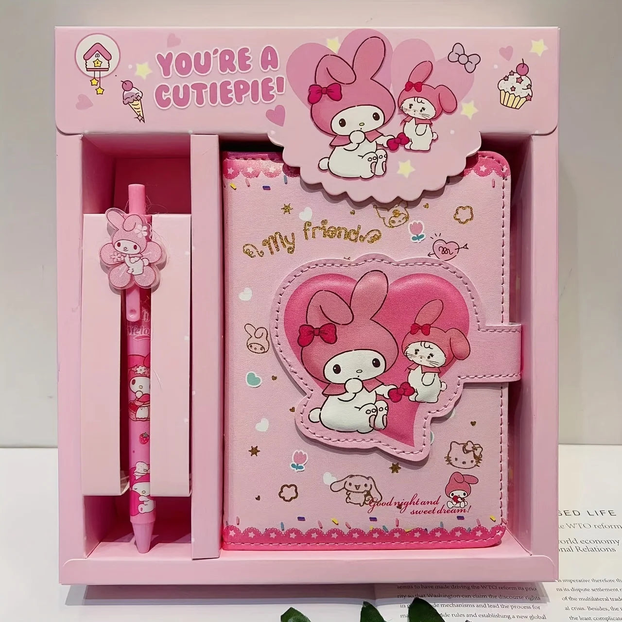 Pink stationery set with cartoon character, including a pen and notebook, in a box.