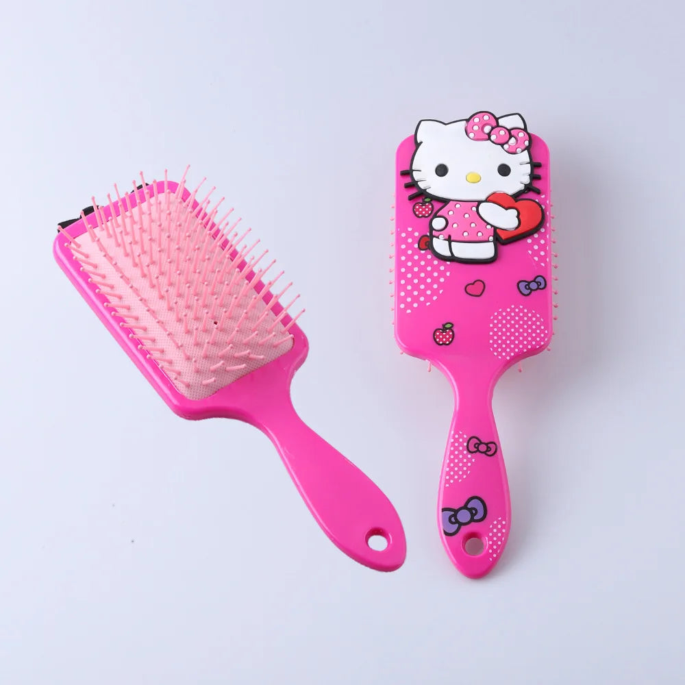 Pink hairbrush with Hello Kitty design on a light purple background
