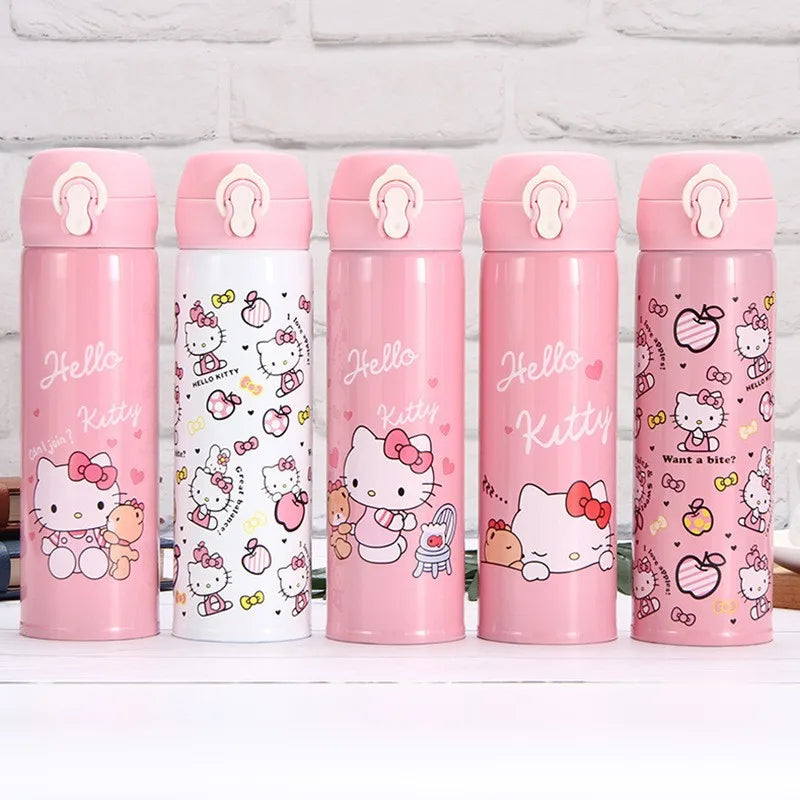 Set of pink Hello Kitty-themed water bottles on a white surface with a light gray brick wall background.