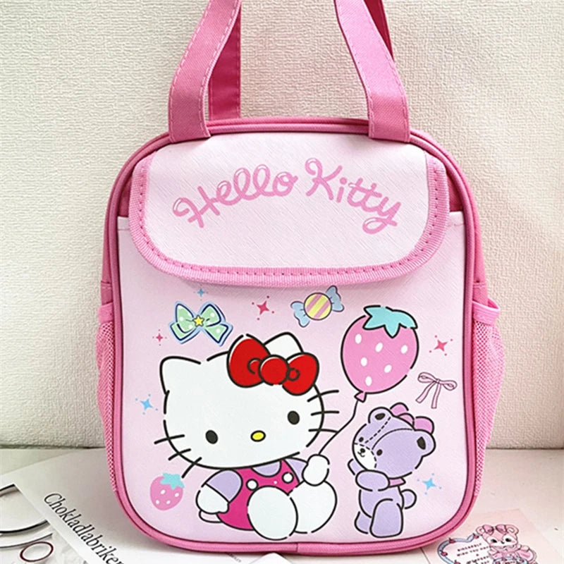 Pink 'Hello Kitty' bag with cartoon characters on a light background
