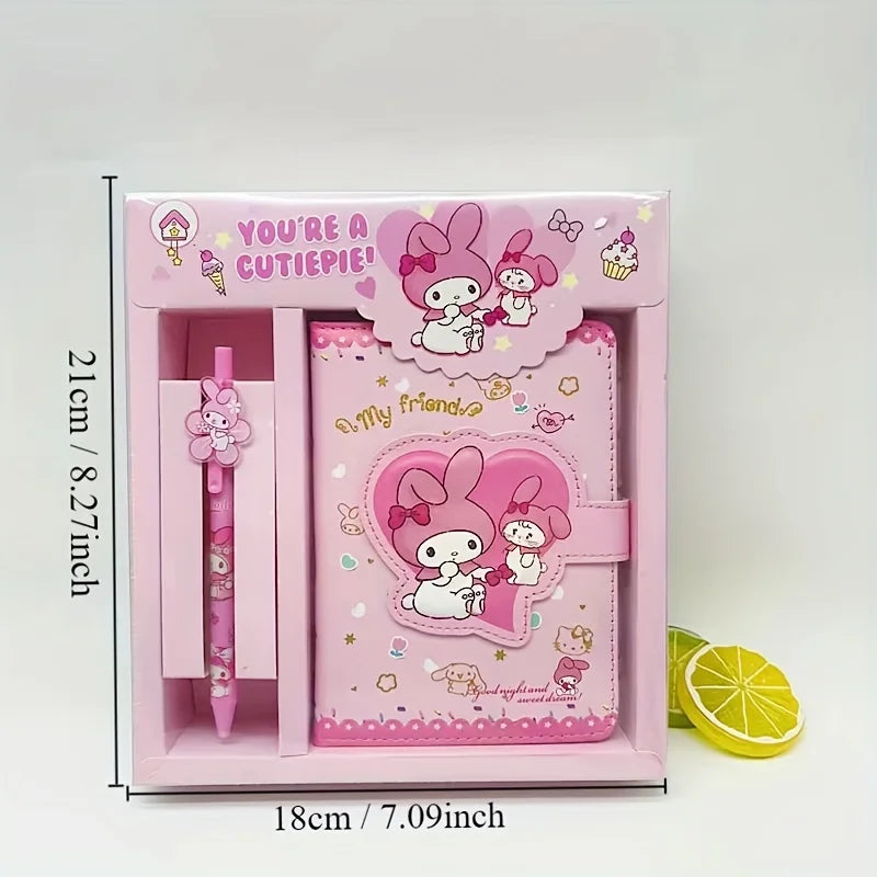 Pink stationery set with cartoon characters in a box, including a pen and notebook, on a white background.