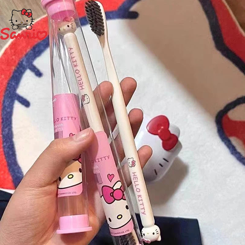 Hello Kitty toothbrush and case held by a hand with a colorful background