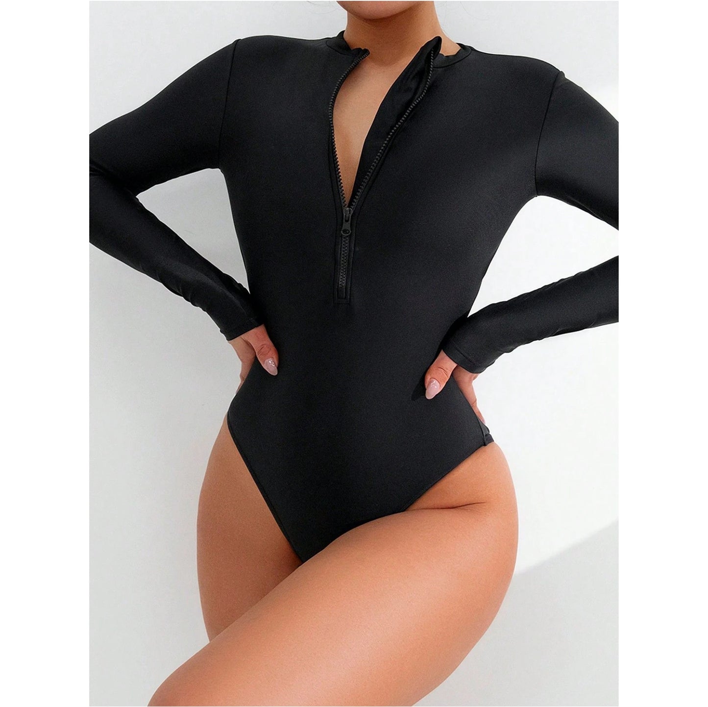 Black long-sleeve swimsuit with a zipper on a white background
