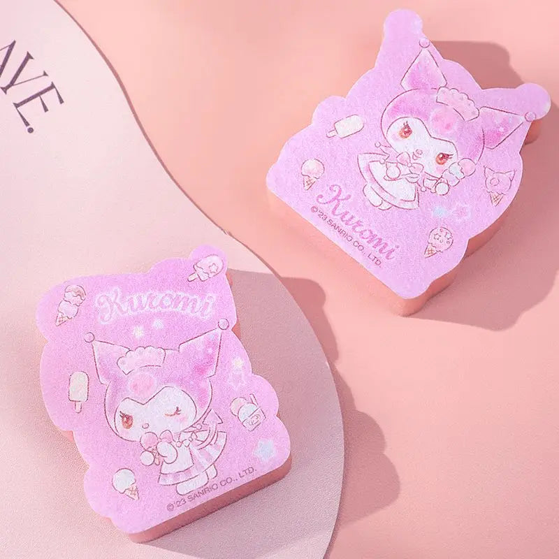 Two pink cartoon character sponges on a light pink background.