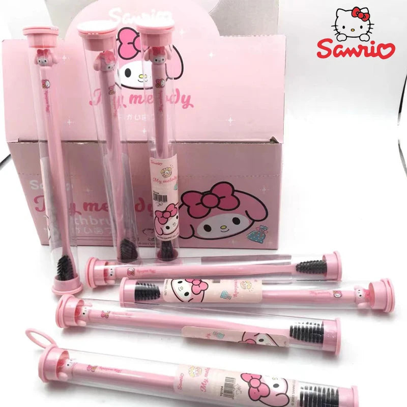 Set of pink toothbrush with Hello Kitty design in front of a Sanrio branded box.