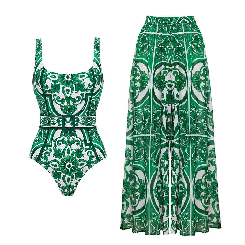 Green and white patterned swimsuit with matching pants on a white background