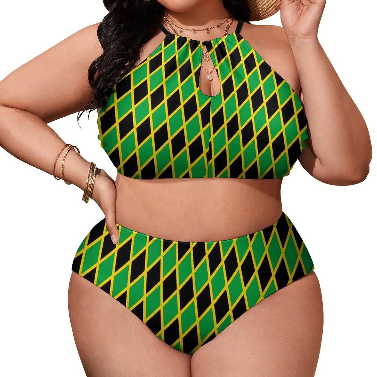 Woman wearing a green and black patterned two-piece swimsuit on a white background