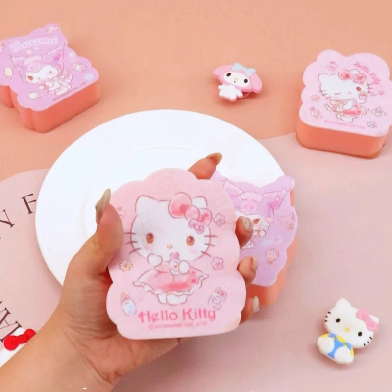 Hello Kitty-themed product held by a hand with more products on a pink background