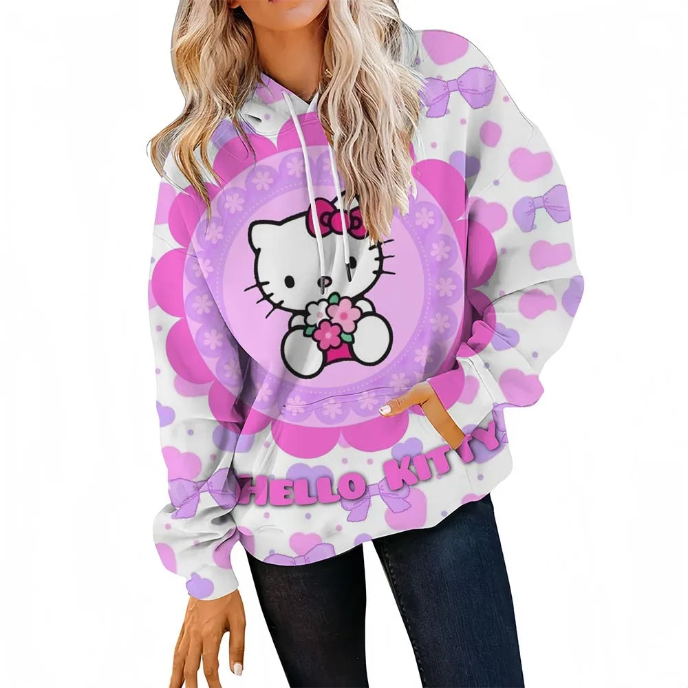 Person wearing a Hello Kitty-themed hoodie with pink and purple patterns on a white background