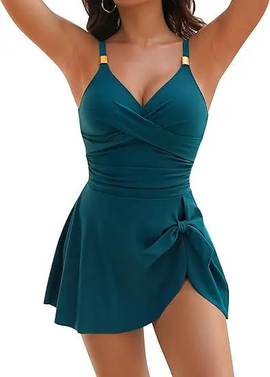 Teal swimsuit with a bow detail on a white background