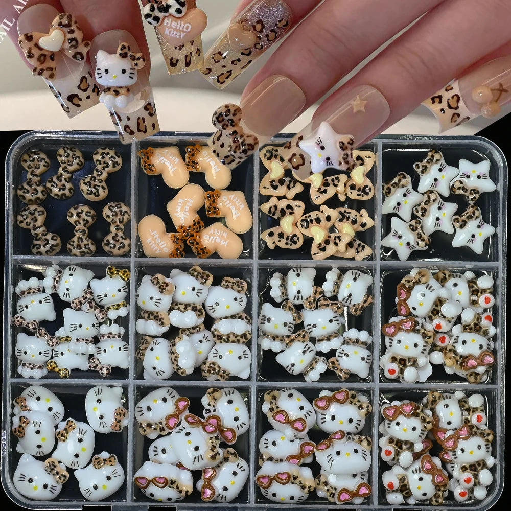 Set of decorative resin charms including Hello Kitty and animal designs in a clear plastic case.