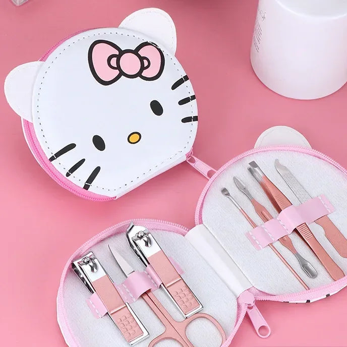 Pink nail care set with Hello Kitty design on a pink background
