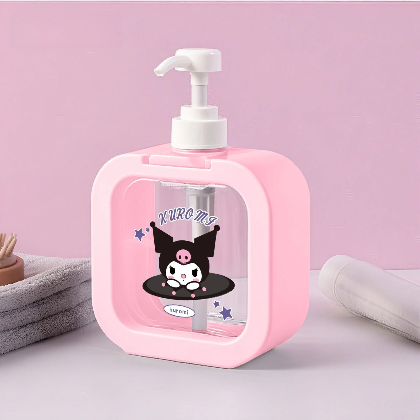Pink soap dispenser with cartoon character on a pink background