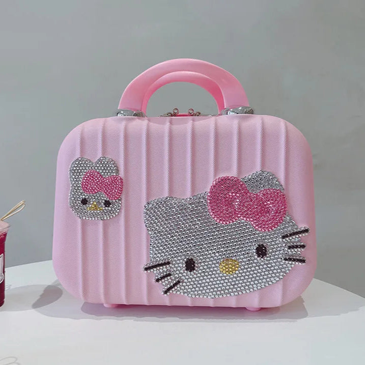 Pink makeup case with Hello Kitty design on a white surface