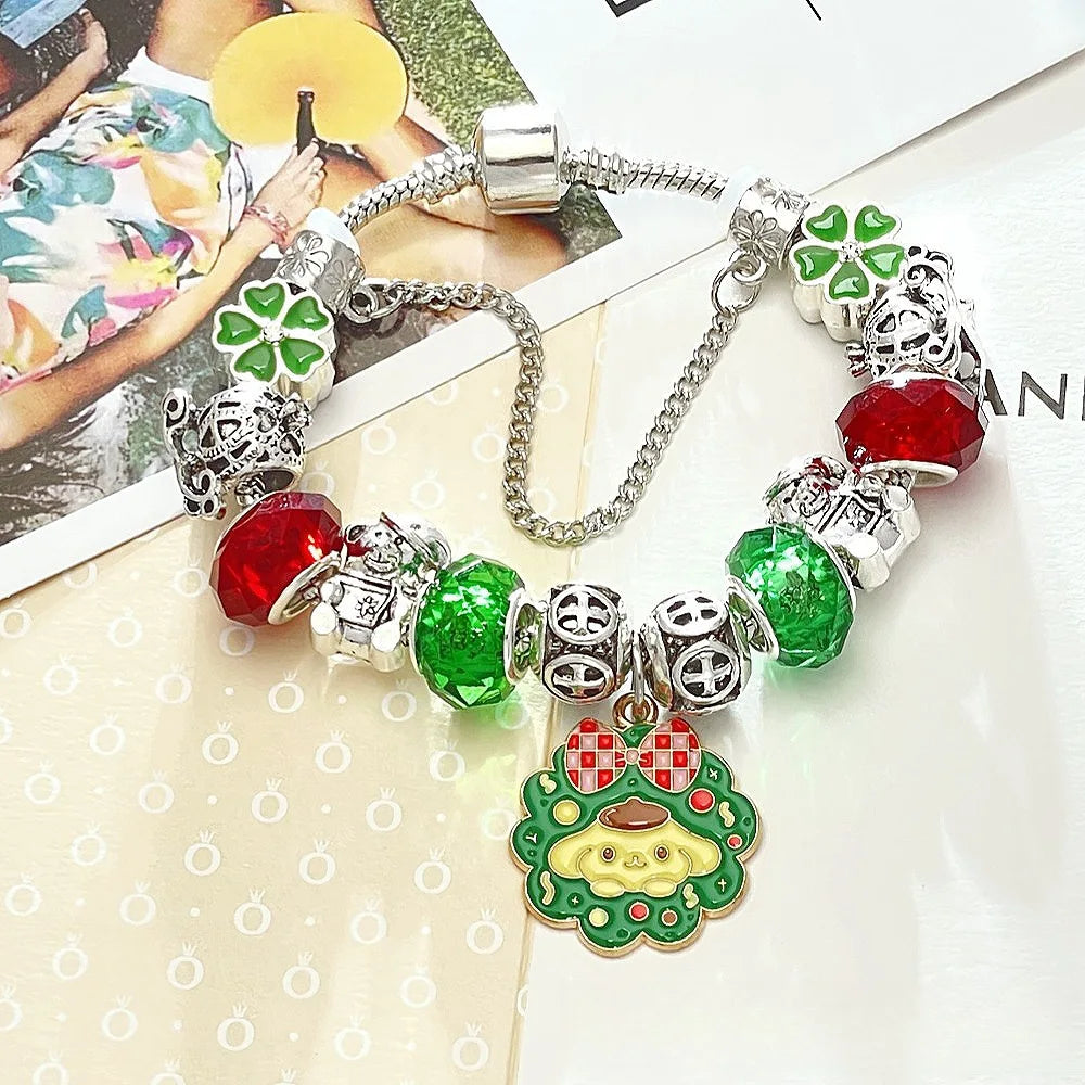 Pandora-style charm bracelet with colorful charms on a magazine background