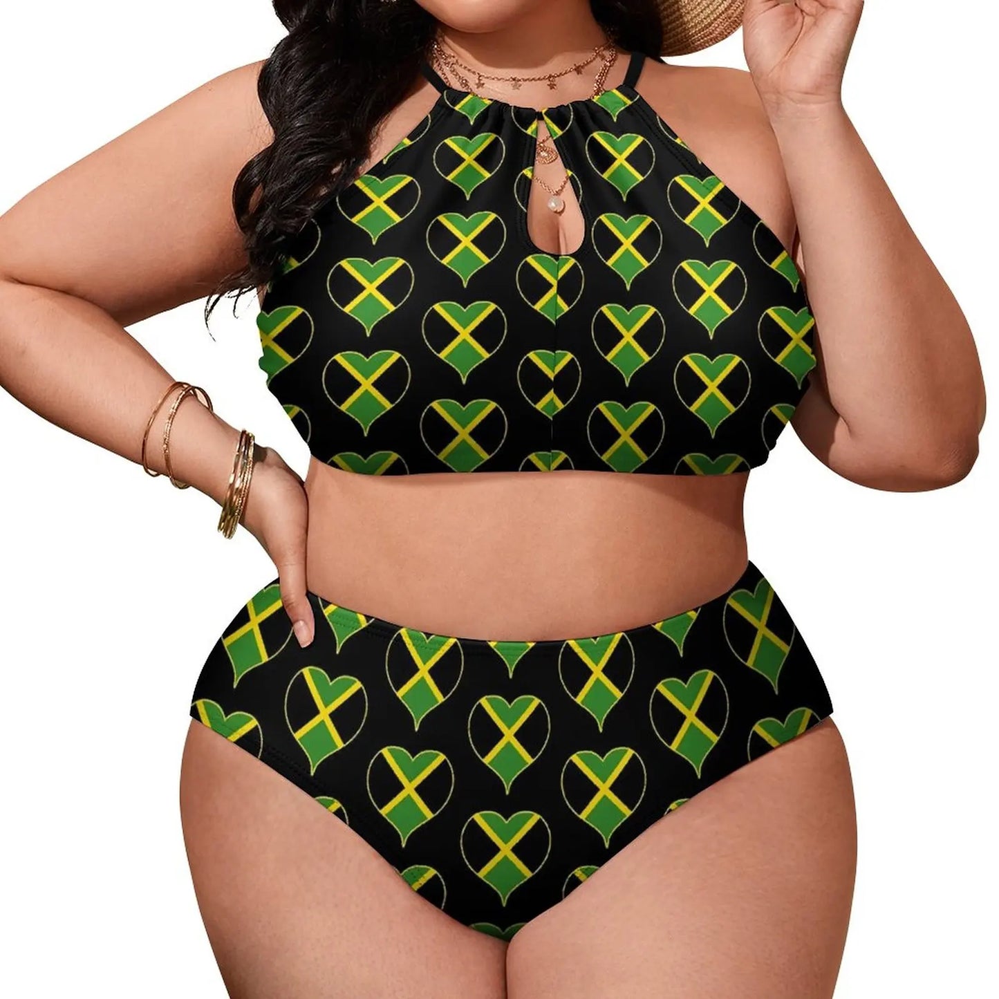 Woman wearing a black bikini with green and yellow heart patterns on a white background