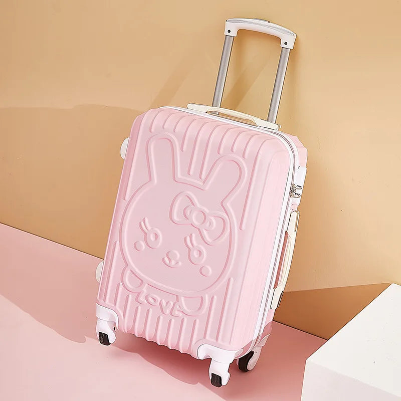 Pink suitcase with a bunny design on a beige background