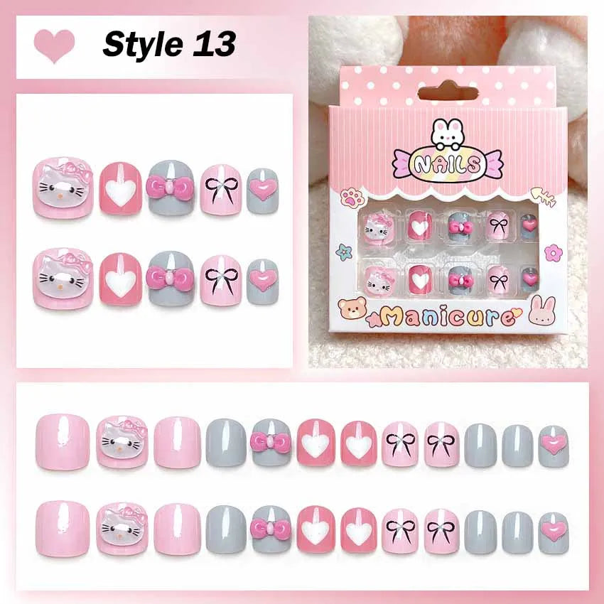 Set of cartoon-themed false nails with packaging on a pink background