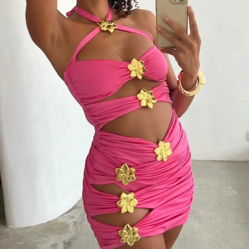 Pink dress with gold floral embellishments worn by a person, taking a mirror selfie.