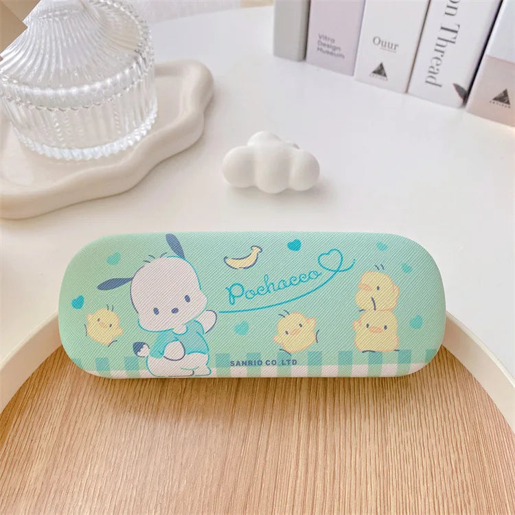 Cartoon-themed glasses case on a wooden surface with a light background