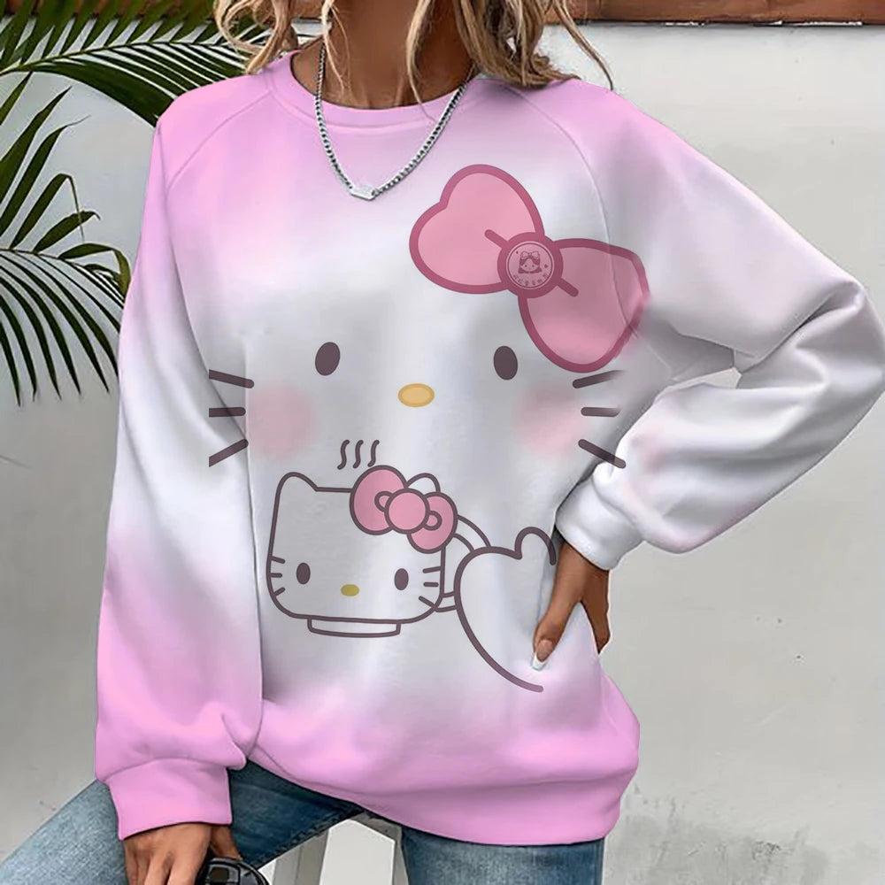 Person wearing a Hello Kitty-themed sweatshirt with a pink bow design.