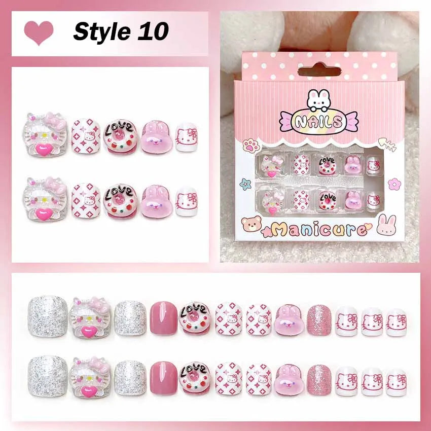 Set of cartoon-themed false nails with packaging on a pink background